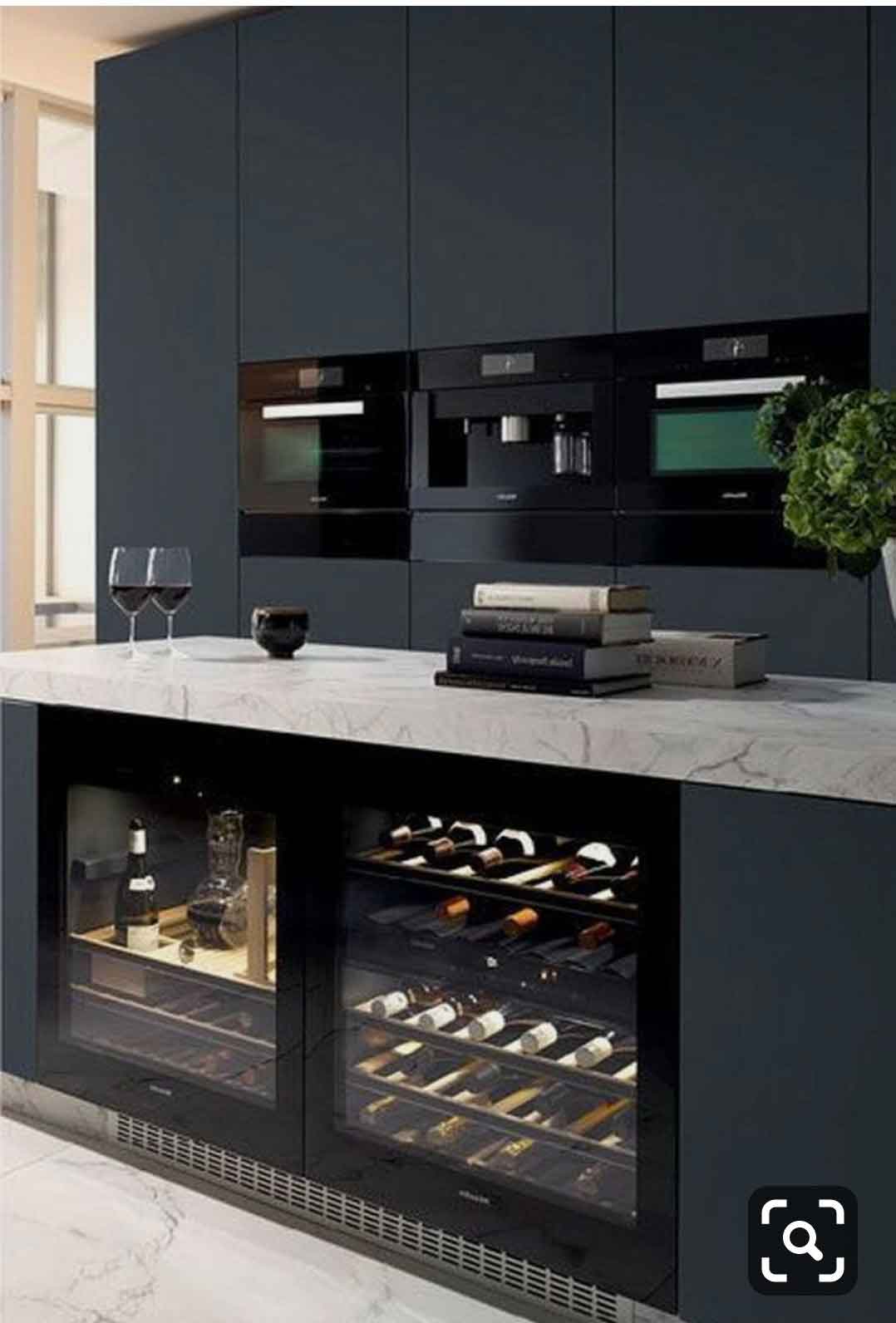 kitcehn island with built in wine cabinet