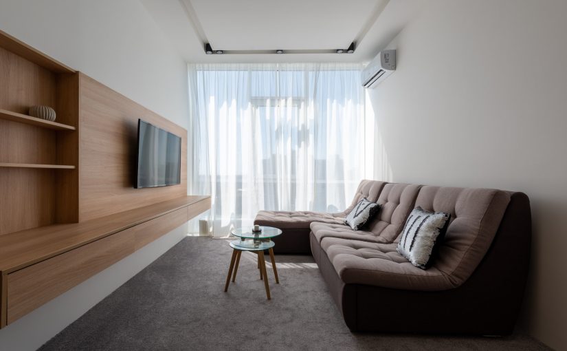 spacious living room with sofa and tv